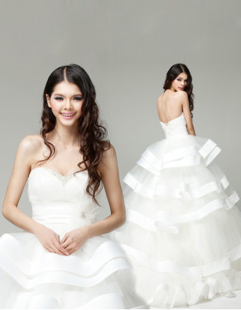 Stunning Beaded Sweetheart Ball Gown Tulle Wedding Dress with Tiered Skirt